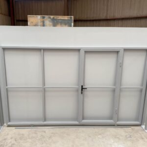 puerta corredera con puerta peatonal gris antracita Valencia